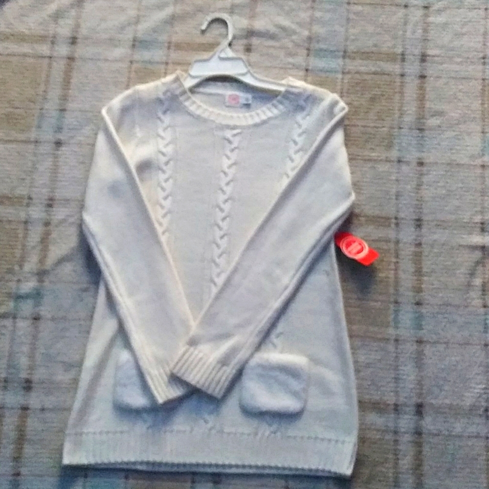 I'm selling a white sweater